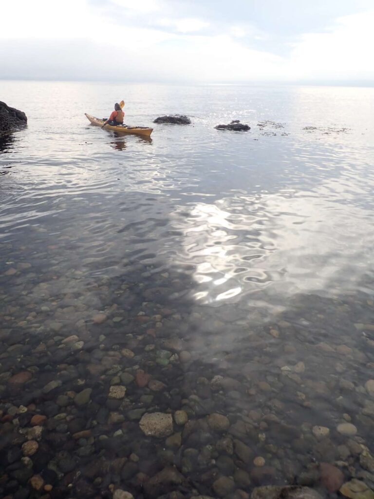 Giovannina paddling around Turn Island